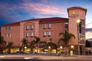 a building with a sign on the side of it at La Quinta by Wyndham Inglewood in Inglewood