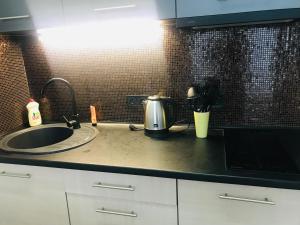 Dapur atau dapur kecil di Apartment SMART PLAZA OBOLON' +11 gambar