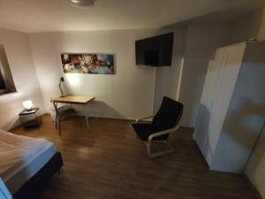 TV a/nebo společenská místnost v ubytování White Pearl Hostel 2