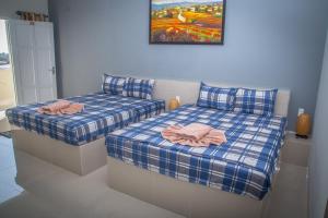 Ліжко або ліжка в номері Mui Ne Hills Budget Hotel