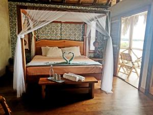 Postel nebo postele na pokoji v ubytování Isleta El Recedo, Entire Island with Personal Staff