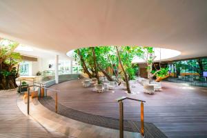 Vrt pred nastanitvijo Tambuli Seaside Resort and Spa