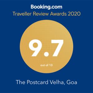 un cercle jaune avec son numéro dans l'établissement The Postcard Velha, Goa, à Vieux-Goa