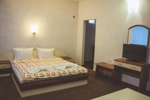 Postel nebo postele na pokoji v ubytování Edi Hotel + 37 fotografií