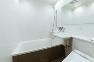 Ванна кімната в HOTEL KARAE