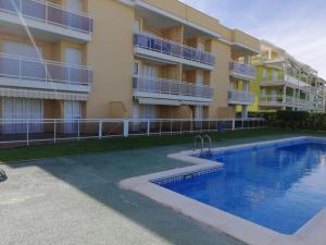Bazén v ubytovaní PRIMERISIMA LINES DE PLAYA AP10 apartamento alebo v jeho blízkosti