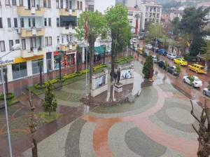 a view of a city street in the rain at Hakbilir Pansiyon in Amasra