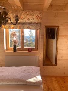 Postel nebo postele na pokoji v ubytování Chalet Die Berghexn