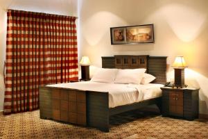 Cama ou camas em um quarto em Marian Hotel