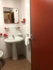 Koupelna v ubytování Albergo Casa dell'Ospite