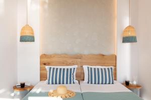 Postel nebo postele na pokoji v ubytování Varkotopi Villas