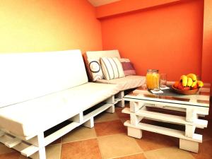 Posezení v ubytování Tena Apartment
