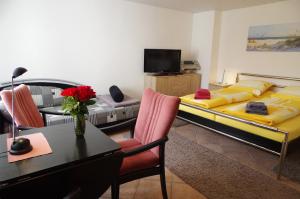 Postel nebo postele na pokoji v ubytování Gästehaus Gaens - Ferienzimmer + 12 fotografií