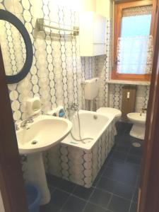 Een badkamer bij Casa Ciliegia
