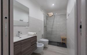 a bathroom with a toilet and a sink and a shower at 20 metri dal mare in Imperia