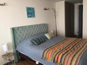 Postel nebo postele na pokoji v ubytování Costa Borgoño- Con Con
