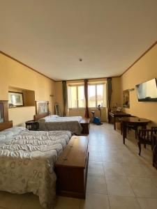 TV a/nebo společenská místnost v ubytování Vogue Hotel Arezzo