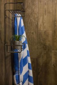 a towel rack with a blue and white towel at Beachlands Hotel in Weston-super-Mare