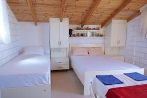 Postel nebo postele na pokoji v ubytování Villa Klea