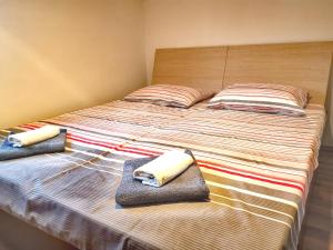 Posteľ alebo postele v izbe v ubytovaní Tena Apartment