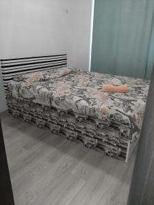 Ένα ή περισσότερα κρεβάτια σε δωμάτιο στο Luxury Daniel Apartament Residence Militari