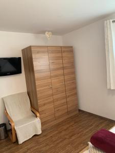 TV a/nebo společenská místnost v ubytování Ferienwohnung Marina