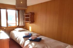 Postel nebo postele na pokoji v ubytování Majestic 424
