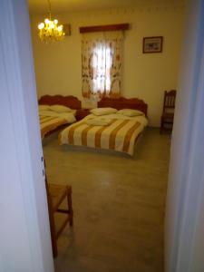Letto o letti in una camera di Hotel Perissa
