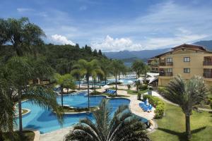 Tầm nhìn ra hồ bơi gần/tại Flat particular no Resort em Angra Dos Reis