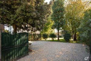 A garden outside Villa Giardino Lucca heated pool, 2 miles Lucca