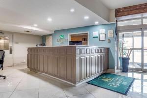 a lobby of a dental office with a counter at Quality Inn in Sarnia