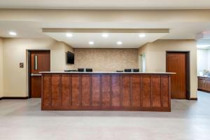 a large lobby with a reception desk in a building at Comfort Inn & Suites West Des Moines in West Des Moines