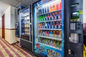 a vending machine filled with lots of bottles of soda at Quality Inn & Suites Lacey Olympia in Lacey