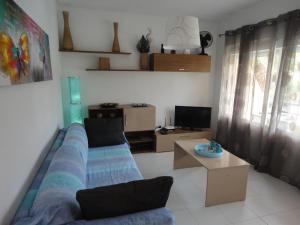 A television and/or entertainment centre at LasVistasApartment