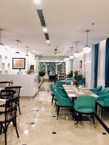 ห้องอาหารหรือที่รับประทานอาหารของ Minasi HanoiOi Hotel