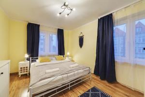 Posteľ alebo postele v izbe v ubytovaní Dream Loft Podwale Staromiejskie