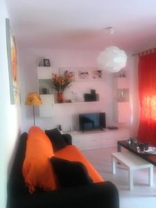 A seating area at LasVistasApartment