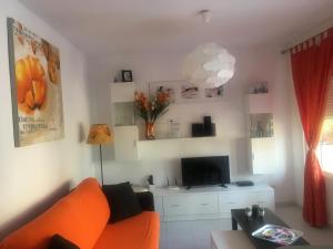 A seating area at LasVistasApartment