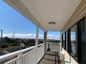 Ein Balkon oder eine Terrasse in der Unterkunft Sea Horse Inn and Cottages