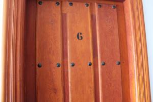 a wooden cabinet with the number on it at Apartamentos Rurales Rosendo: El Jazmin in Capileira +3 photos