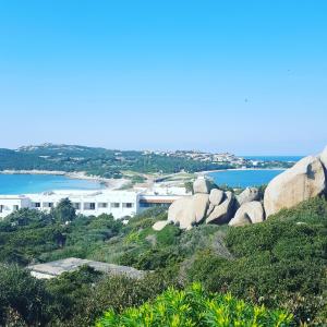 a group of large rocks on top of a hill at Studio S in Santa Teresa Gallura