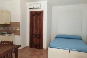 Η κουζίνα ή μικρή κουζίνα στο TINY HOUSE (con piscina e wi-fi)