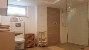 Ένα μπάνιο στο Ferienwohnung Zur Waldkapelle +7 φωτογραφίες