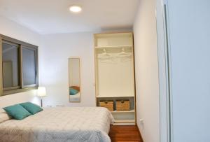 Posteľ alebo postele v izbe v ubytovaní Vivienda vacacional Vistamar