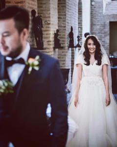 a bride and groom walking down the aisle at Castle in Old Town in Tbilisi City +216 photos