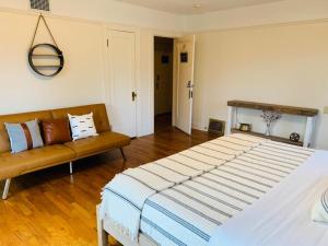 Voodi või voodid majutusasutuse Riverpath Inn toas