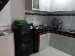 Fotografie z fotogalerie ubytování Budi Asih Guest house Syariah v destinaci Duku