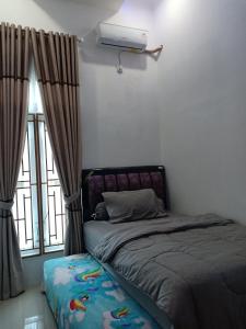 Fotografie z fotogalerie ubytování Budi Asih Guest house Syariah v destinaci Duku