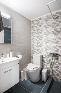 Ванная комната в Mavrogenous Luxury Apartments