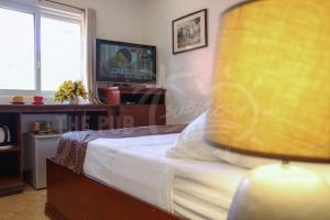 TV a/nebo společenská místnost v ubytování The Pub Hotel